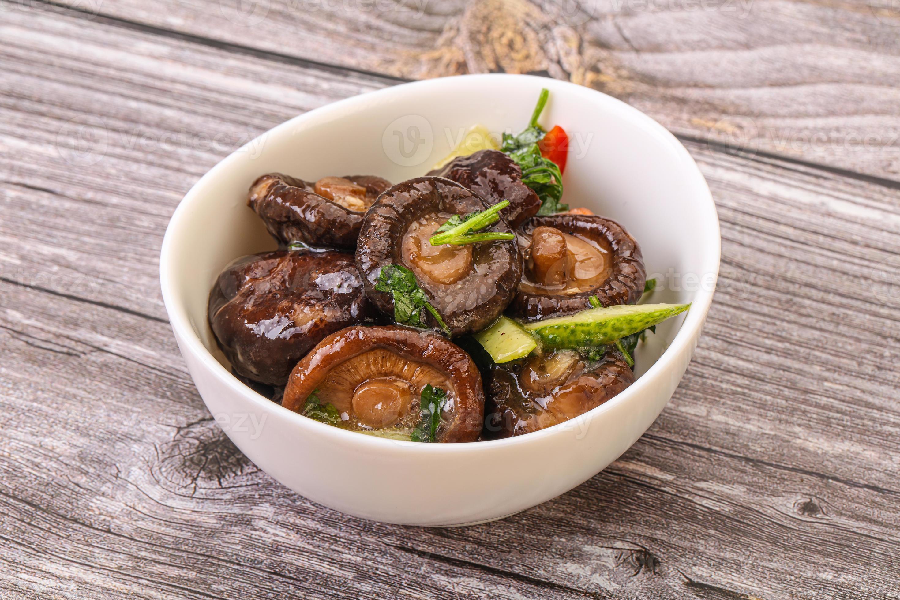 Marinated shiitake mushrooms with herbs 8435472 Stock Photo at Vecteezy