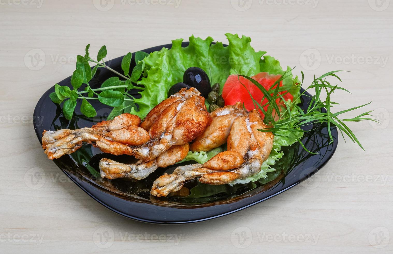 Fried frog legs photo