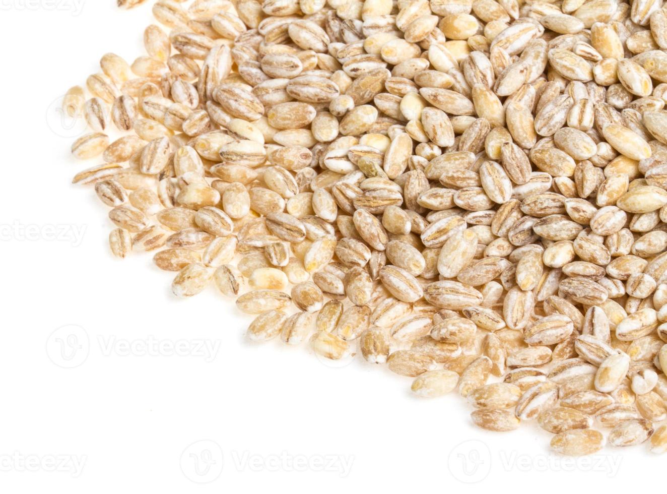Pile of Pearl Barley isolated on white photo