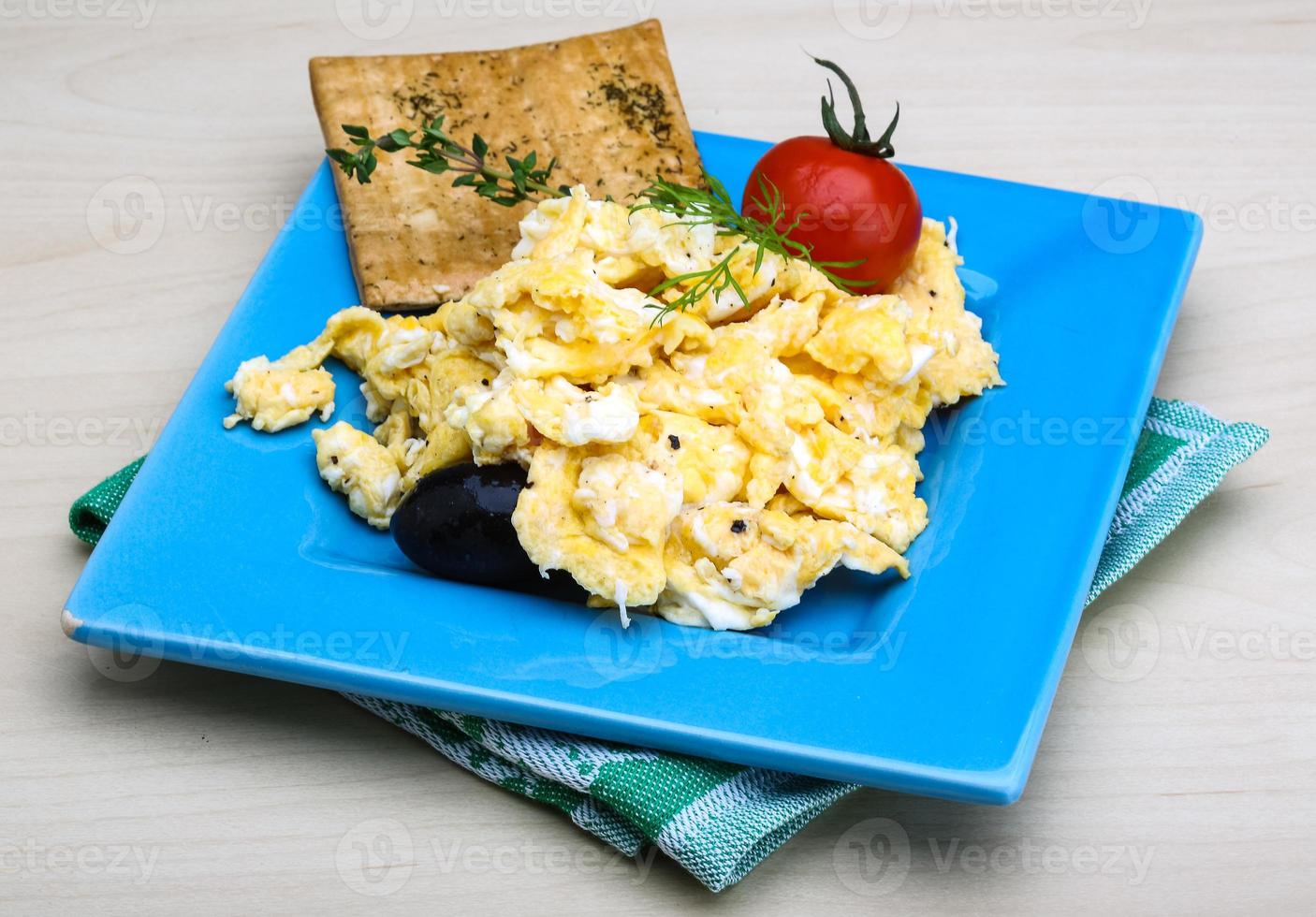 Scrambled eggs with tomato photo