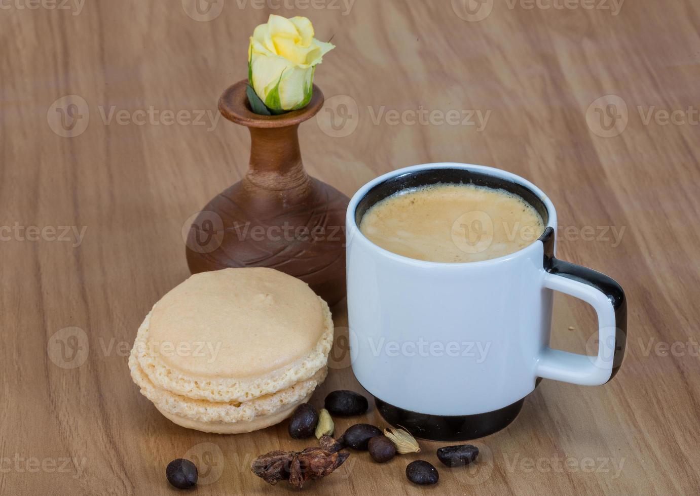 Coffee with macaroons and rose photo