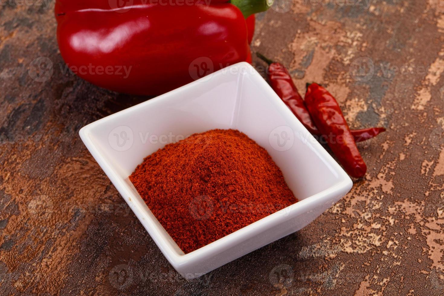 Paprika powder in the bowl photo