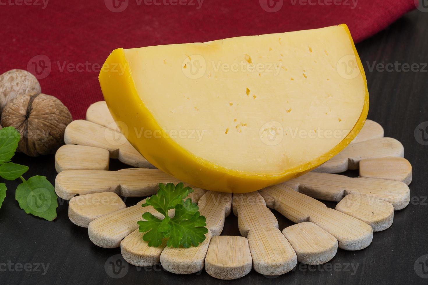 Yellow round cheese photo