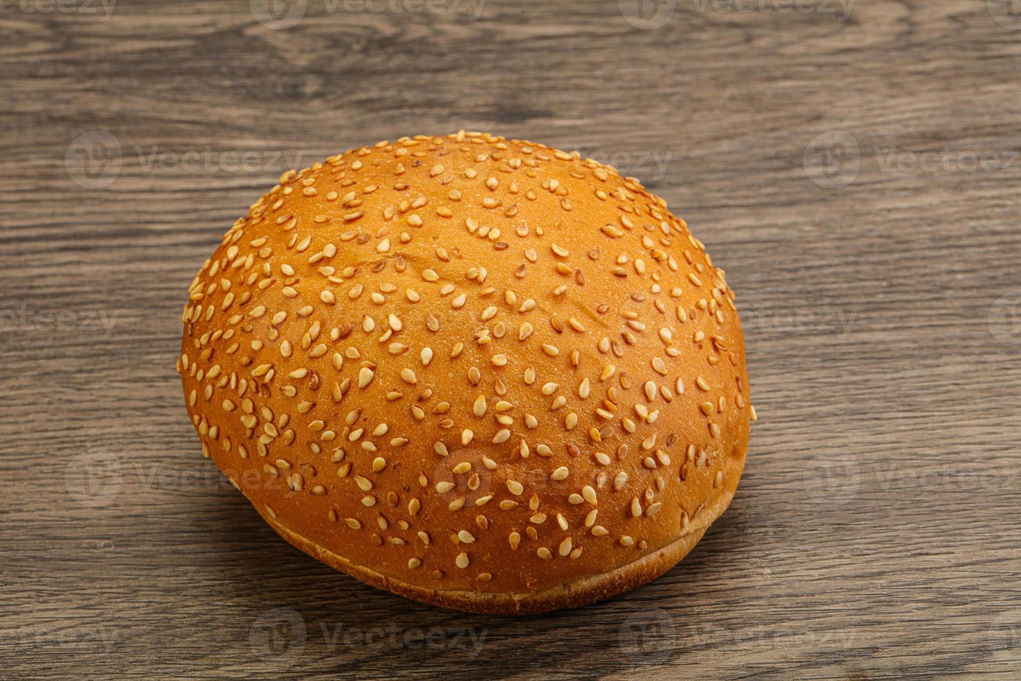 Burger bun with sesame seeds photo