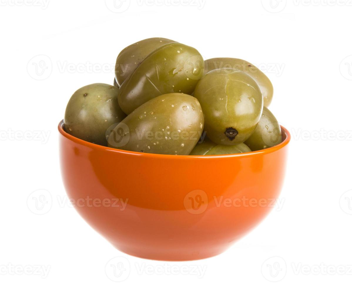 Pickled tomatoes isolated on the white background photo