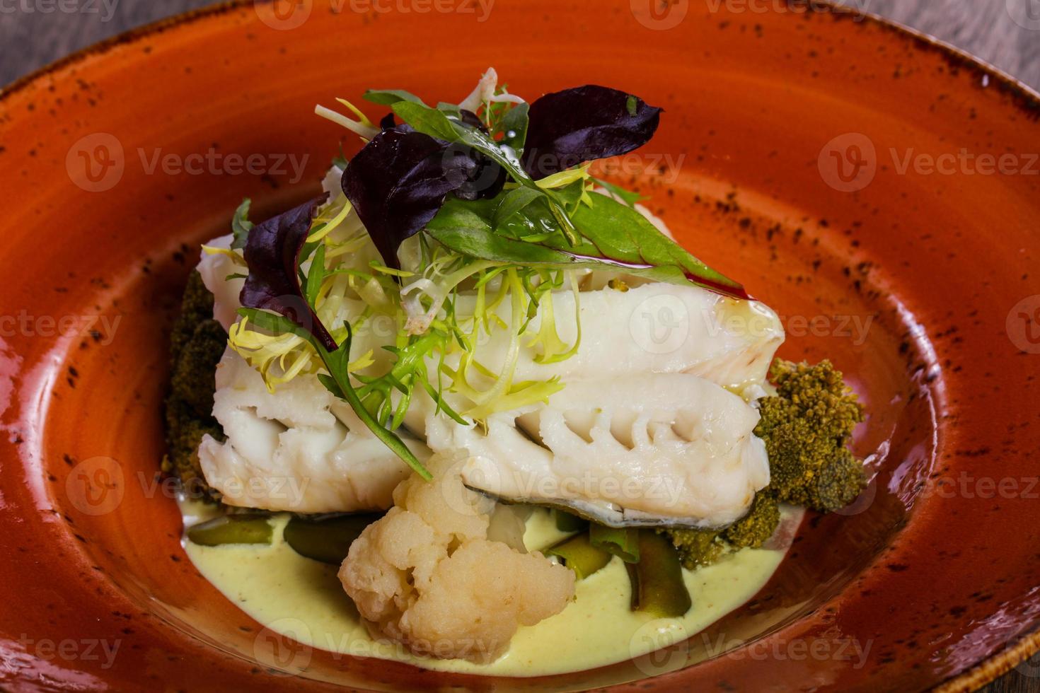 Steamed fith with salad photo