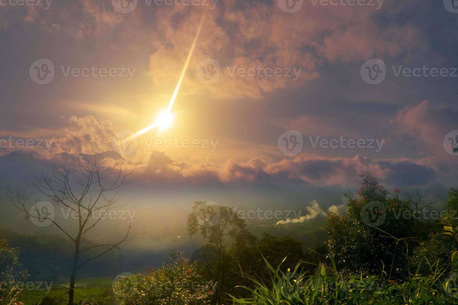 Beautiful panorama in misty mountain forest with sunlight photo