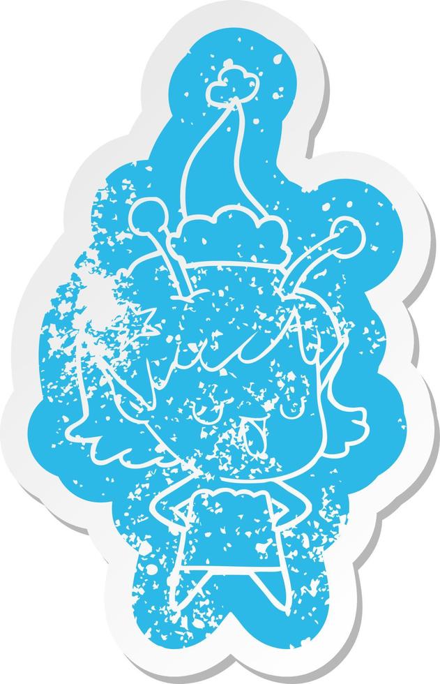 happy alien girl cartoon distressed sticker of a wearing santa hat vector