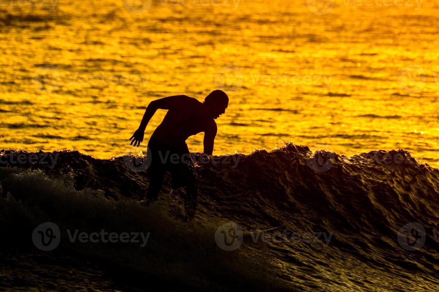 Silhouette Surfer at Sunset photo