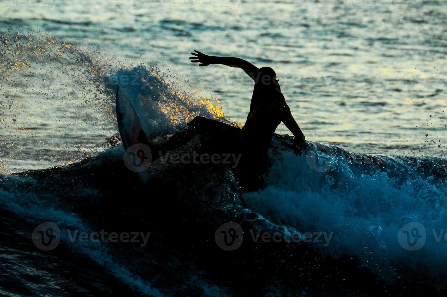 Silhouette Surfer at Sunset photo