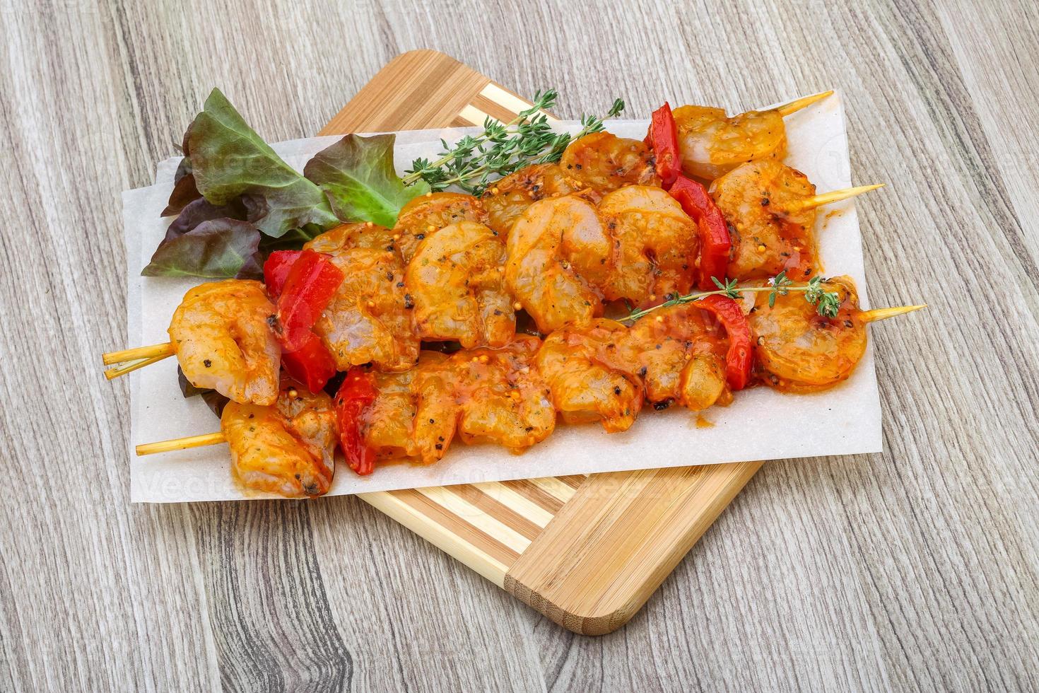 Raw prawn skewer photo