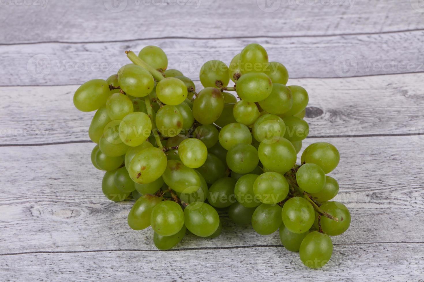 Sweet green grape branch photo