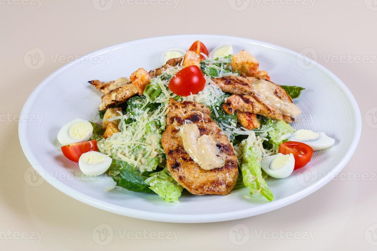 Caesar salad with chicken photo