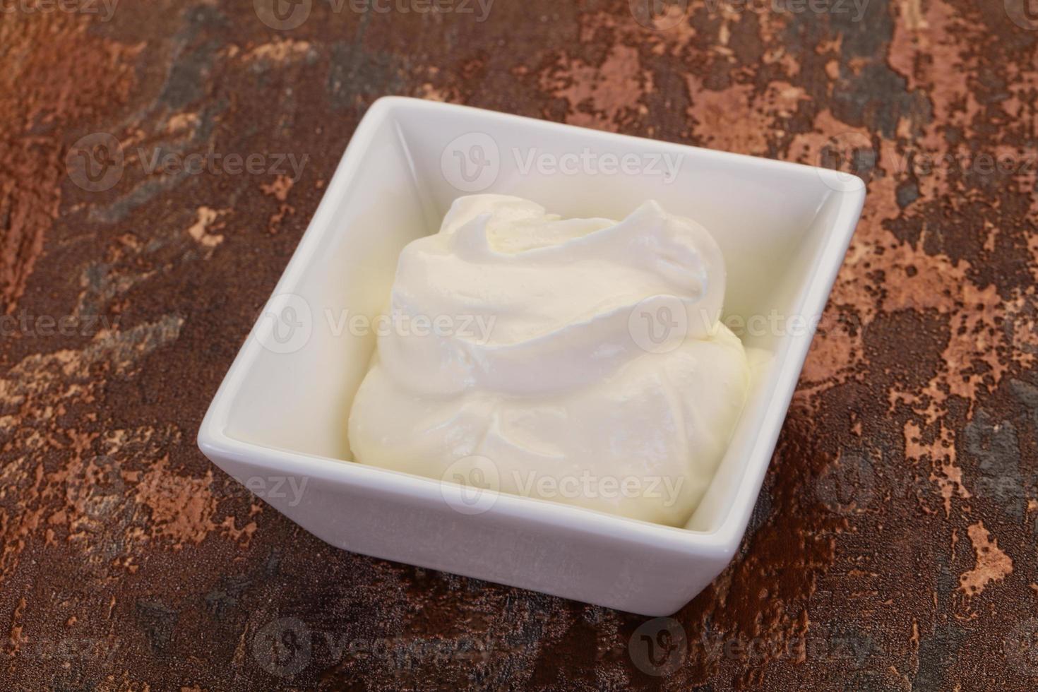 Sour cream in the bowl photo