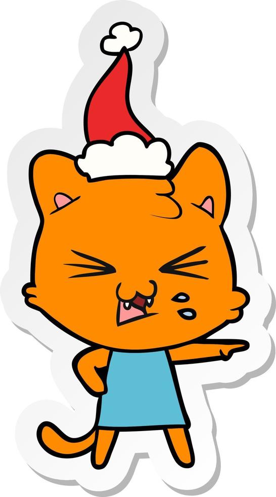 sticker cartoon of a hissing cat wearing santa hat vector