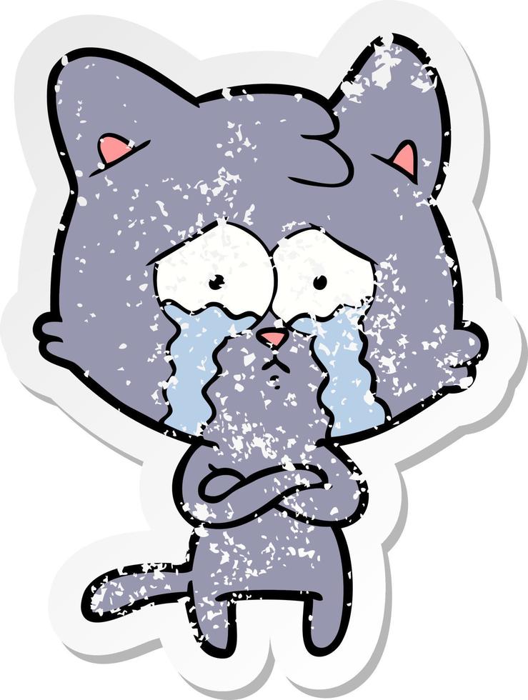 distressed sticker of a cartoon crying cat vector