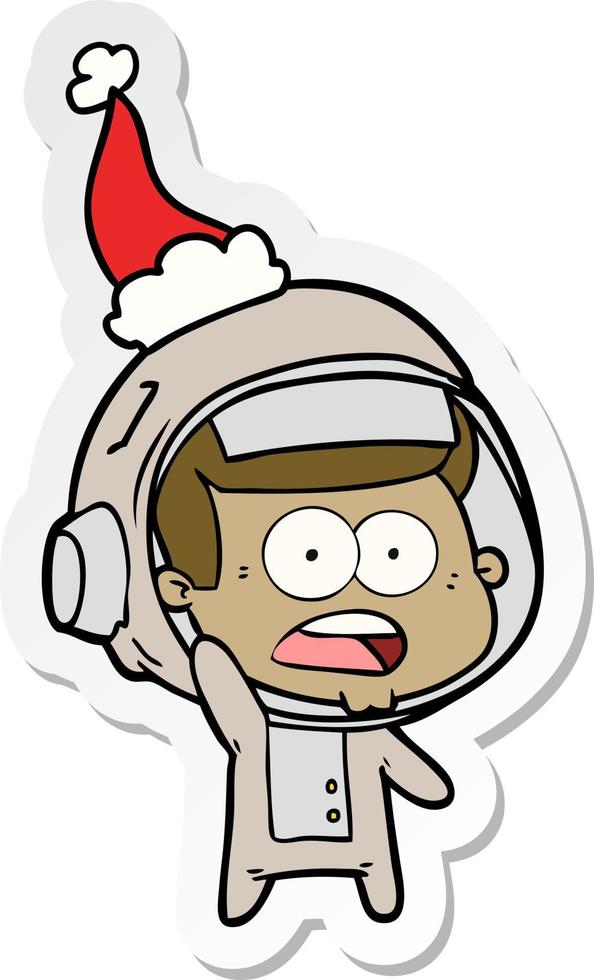 sticker cartoon of a surprised astronaut wearing santa hat vector