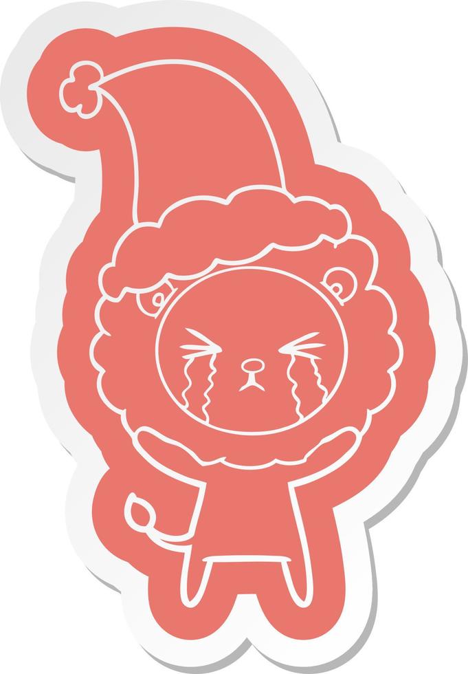 cartoon  sticker of a crying lion wearing santa hat vector