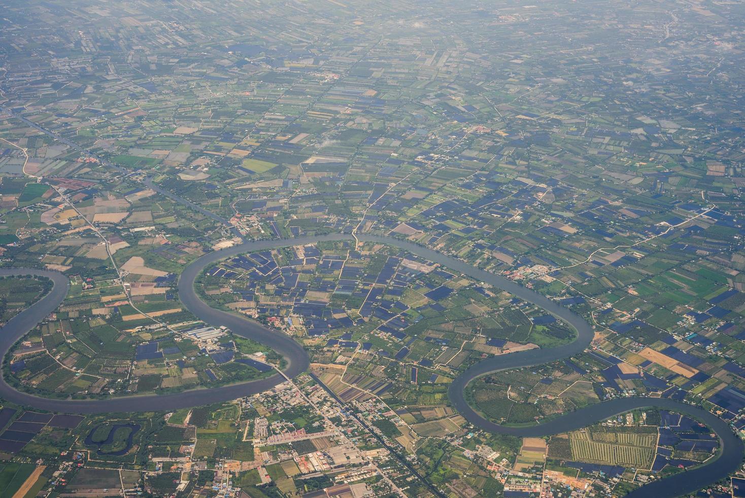 Bird eye view of residential landed early in Thailand. Aerial view from the window of an airplane photo