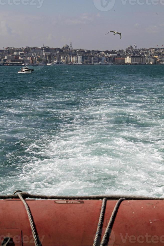 View from a ferry in Istanbul on its way from Europe to Asia on a sunny day. photo