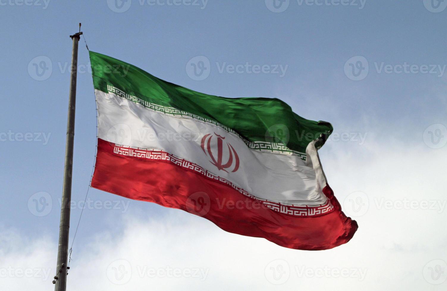 Big Iranian Flag Waving in the Wind photo