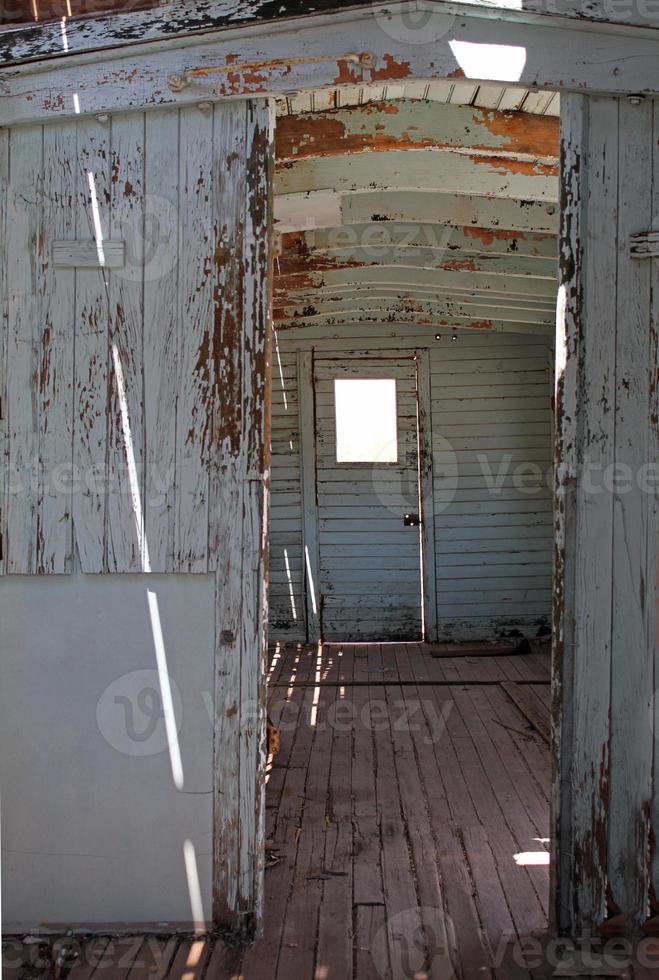 Inside an abandoned train wagon in Death Valley, California photo