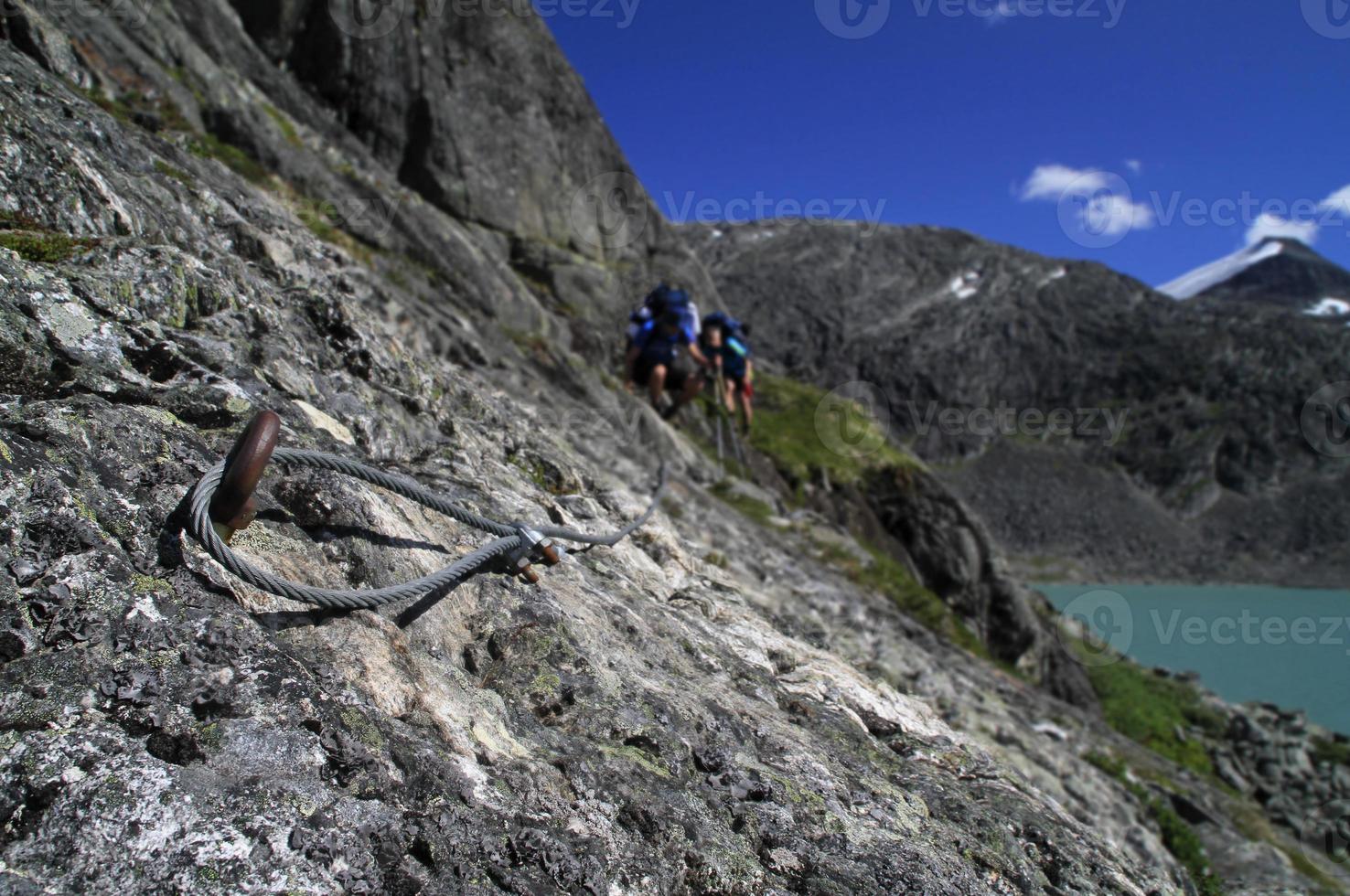 Hiking and climbing through the beautiful landscape of Norway photo