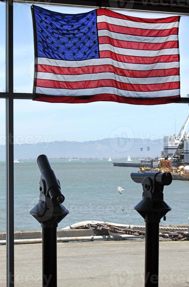 American flag and two telescopes at San Francisco Bay photo