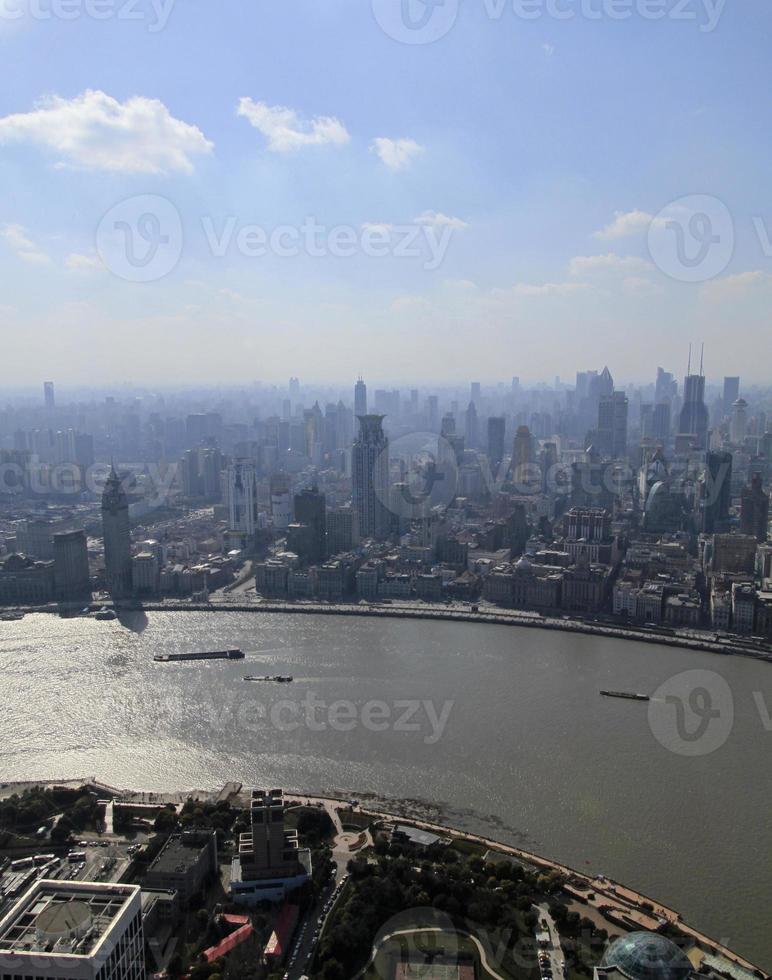 Smog lies over the skyline of Shanghai, China photo