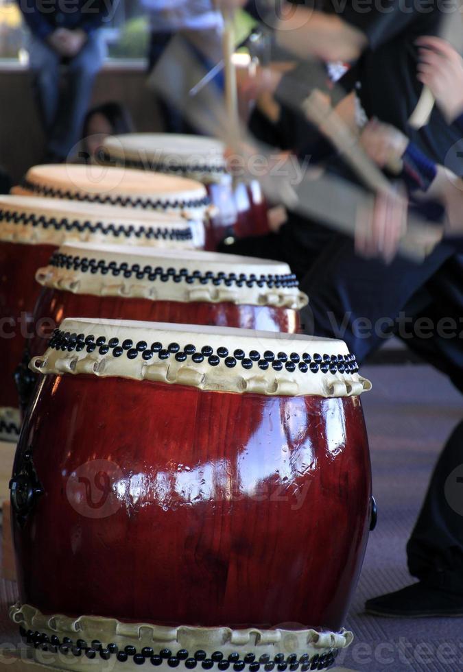 Japanese performers and traditional Taiko drums photo