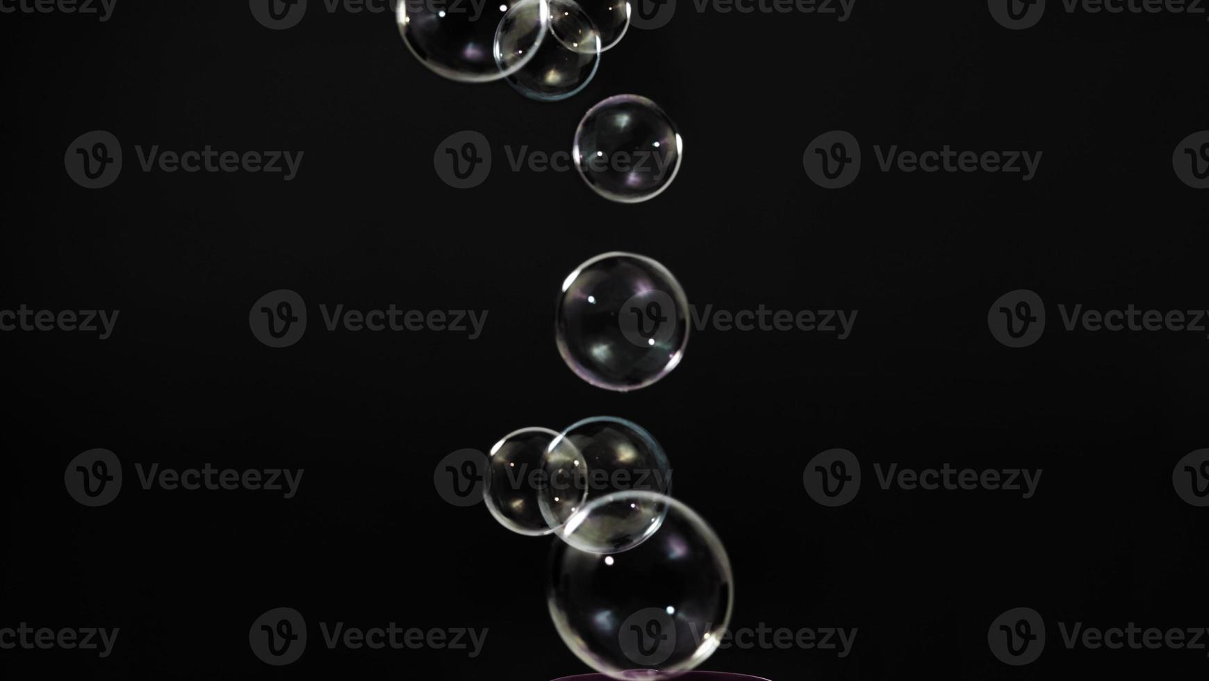 Soap bubble drop or Shampoo bubbles floating like flying in the air photo