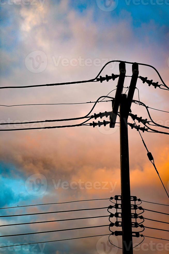 Electricity pole was standed alone in the beautiful Twilight time  in Thailand. photo