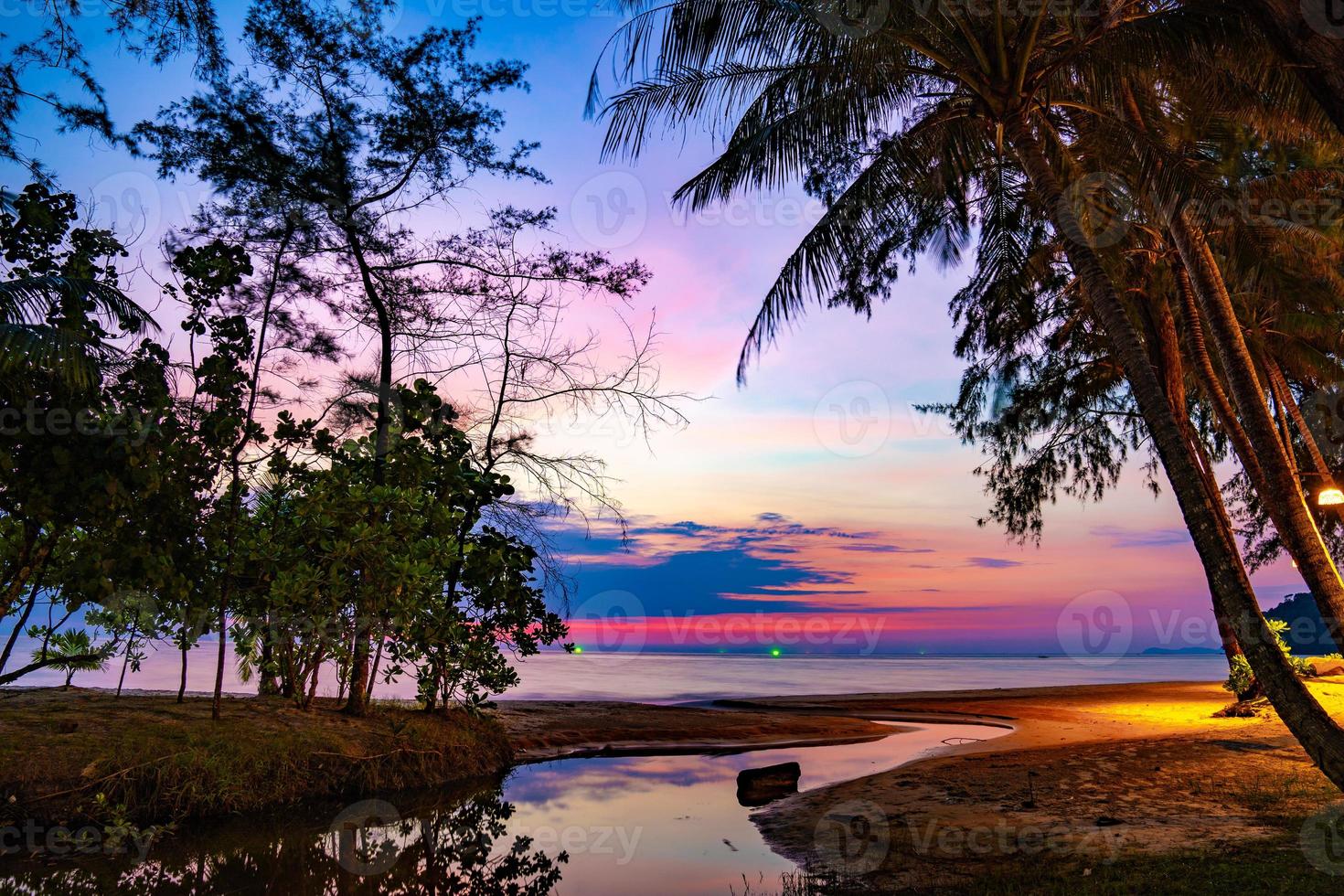 Purple violet sky at the beach and sea, in Twilight Time, Koh Kood, Trad province, Thailand. photo