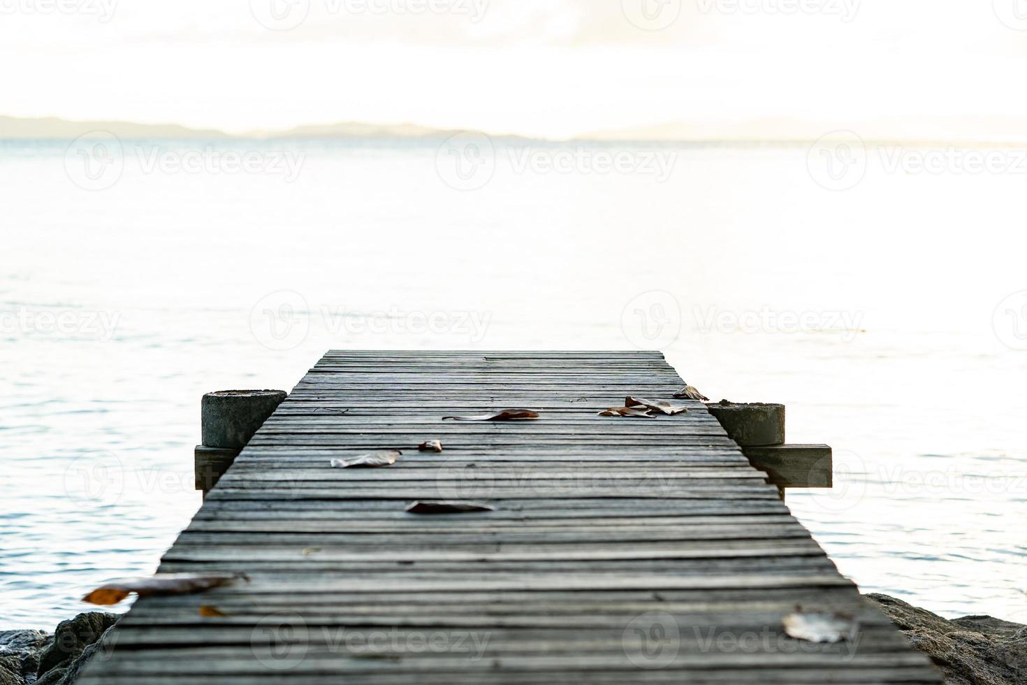 Wood Vintage Terrace on the beach with blue Sea, Ocean, Sky Background photo