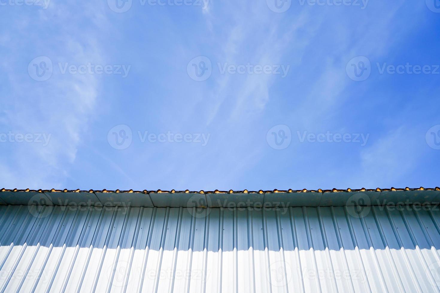 The metal sheet background with blue sky. photo