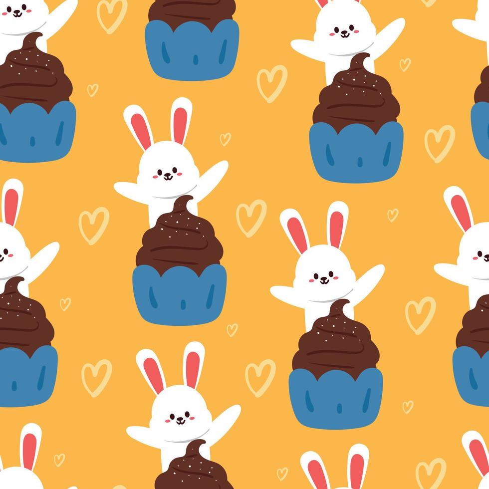 seamless pattern cute cartoon bunny and cupcake vector