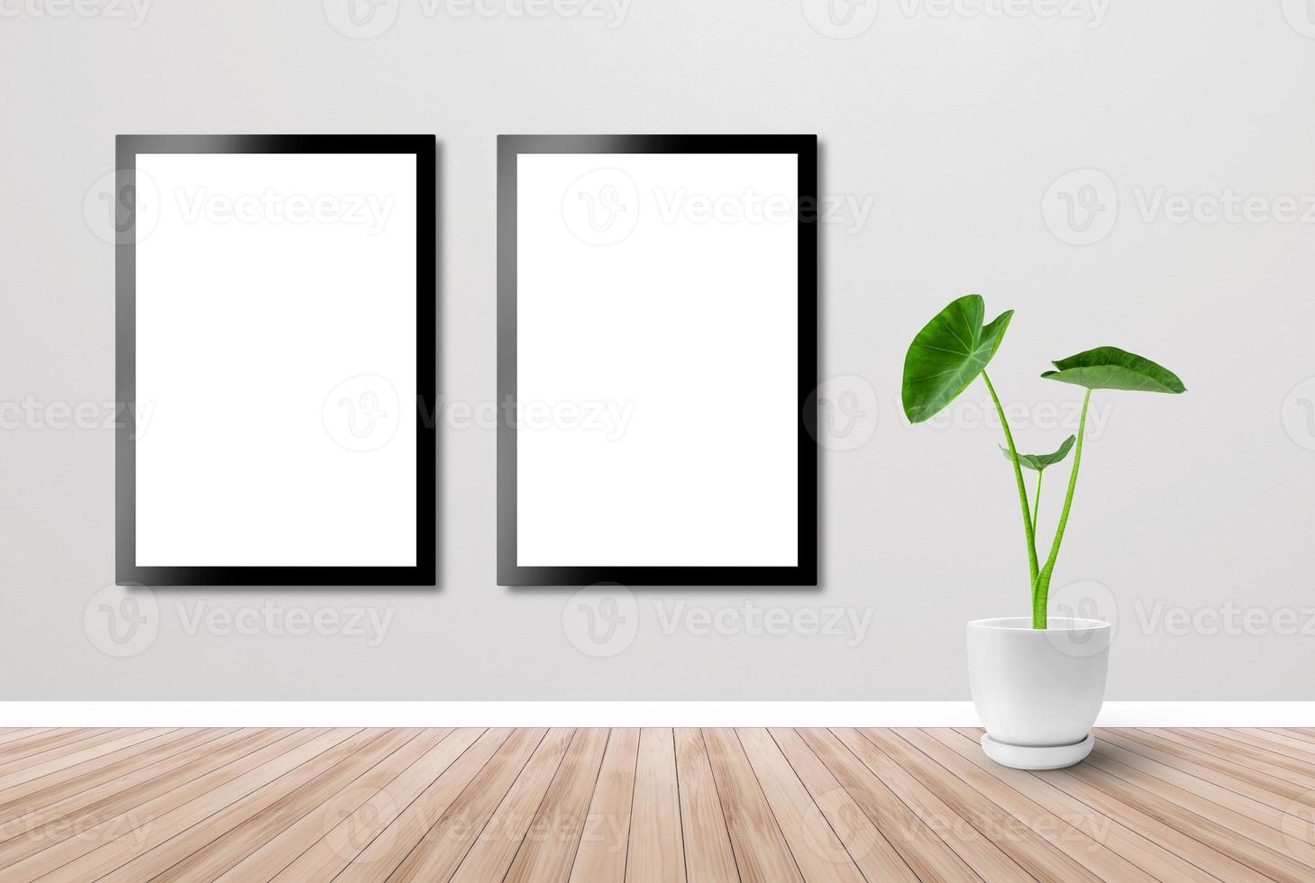 The poster is attached to the wall of the room. Photo frame and wooden floor and tropical plants. Room background. Wallpaper backdrop.