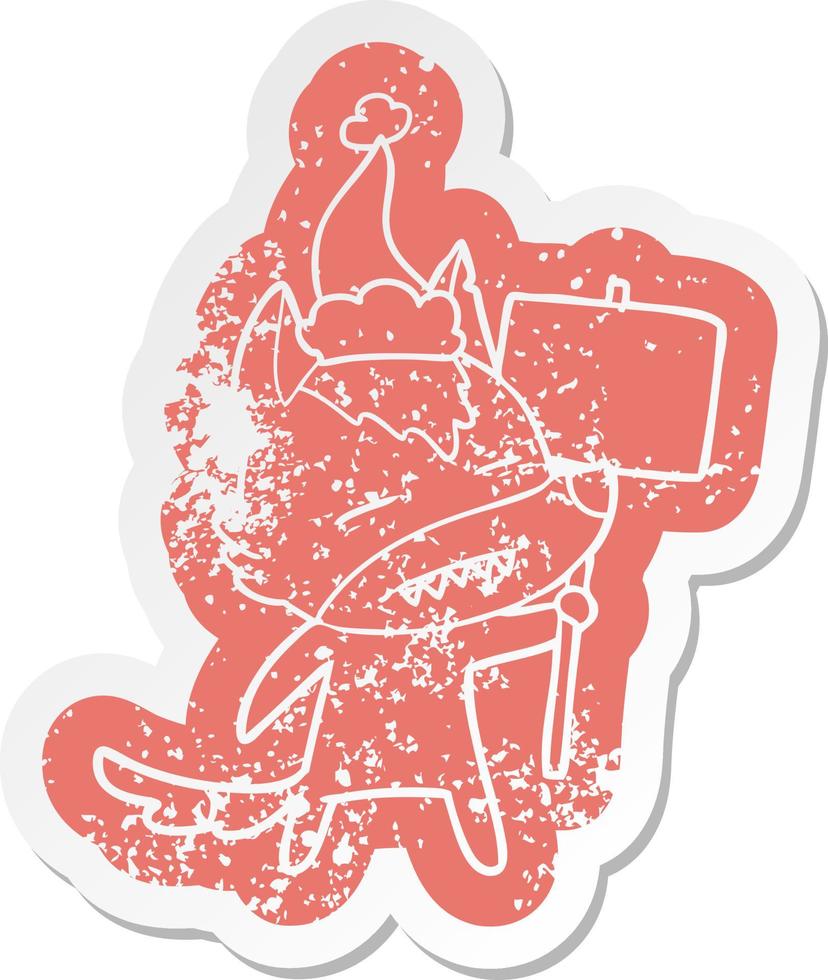 cartoon distressed sticker of a wolf with sign post showing teeth wearing santa hat vector