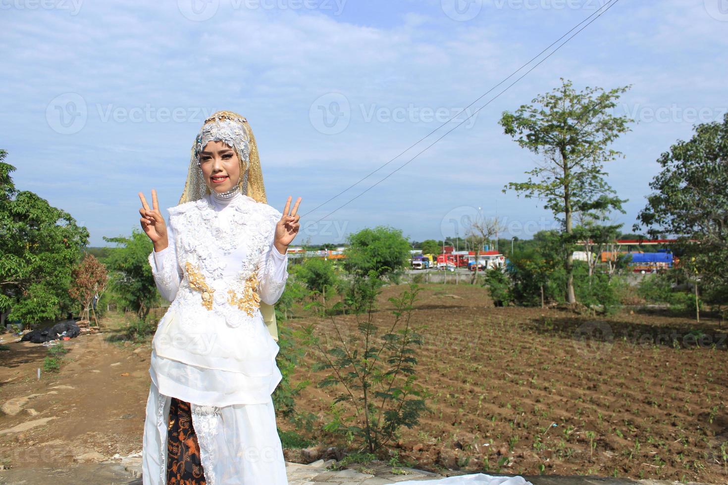 selective focus of women who are wearing wedding dress typical of Java, Indonesia photo