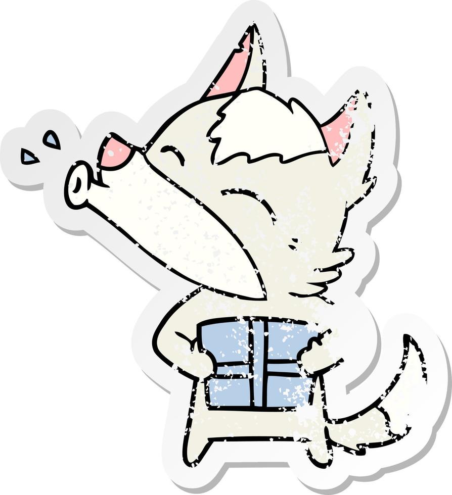 distressed sticker of a howling wolf with christmas present vector