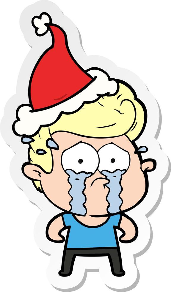 sticker cartoon of a crying man wearing santa hat vector