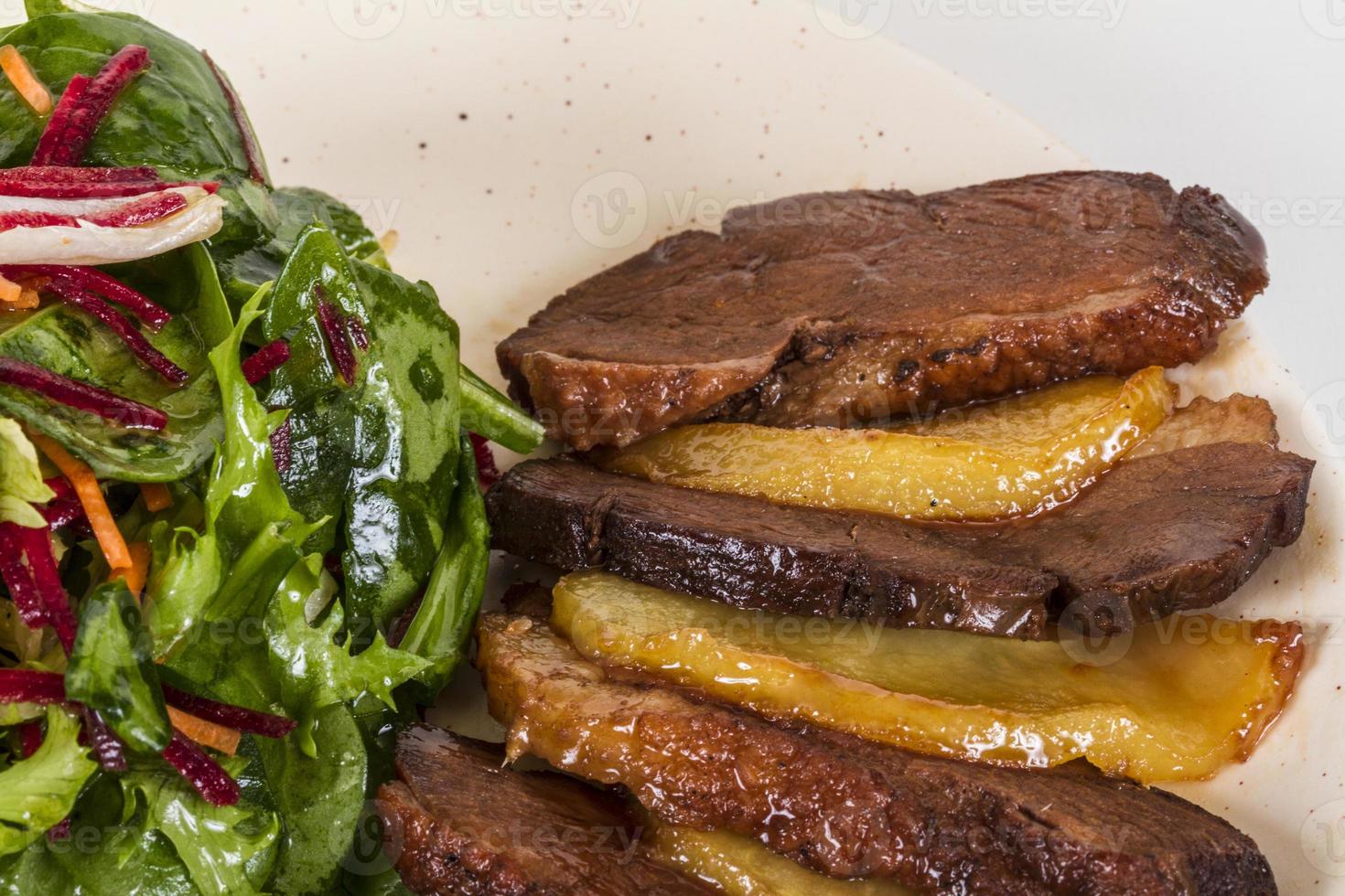 duck fillet, mashed potatoes seasoned with truffle oil, fig and aniseed sauce photo