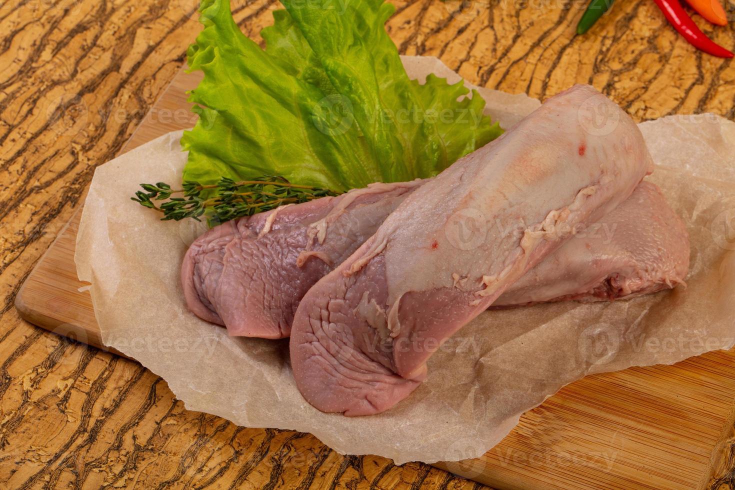 Raw pork tongue photo