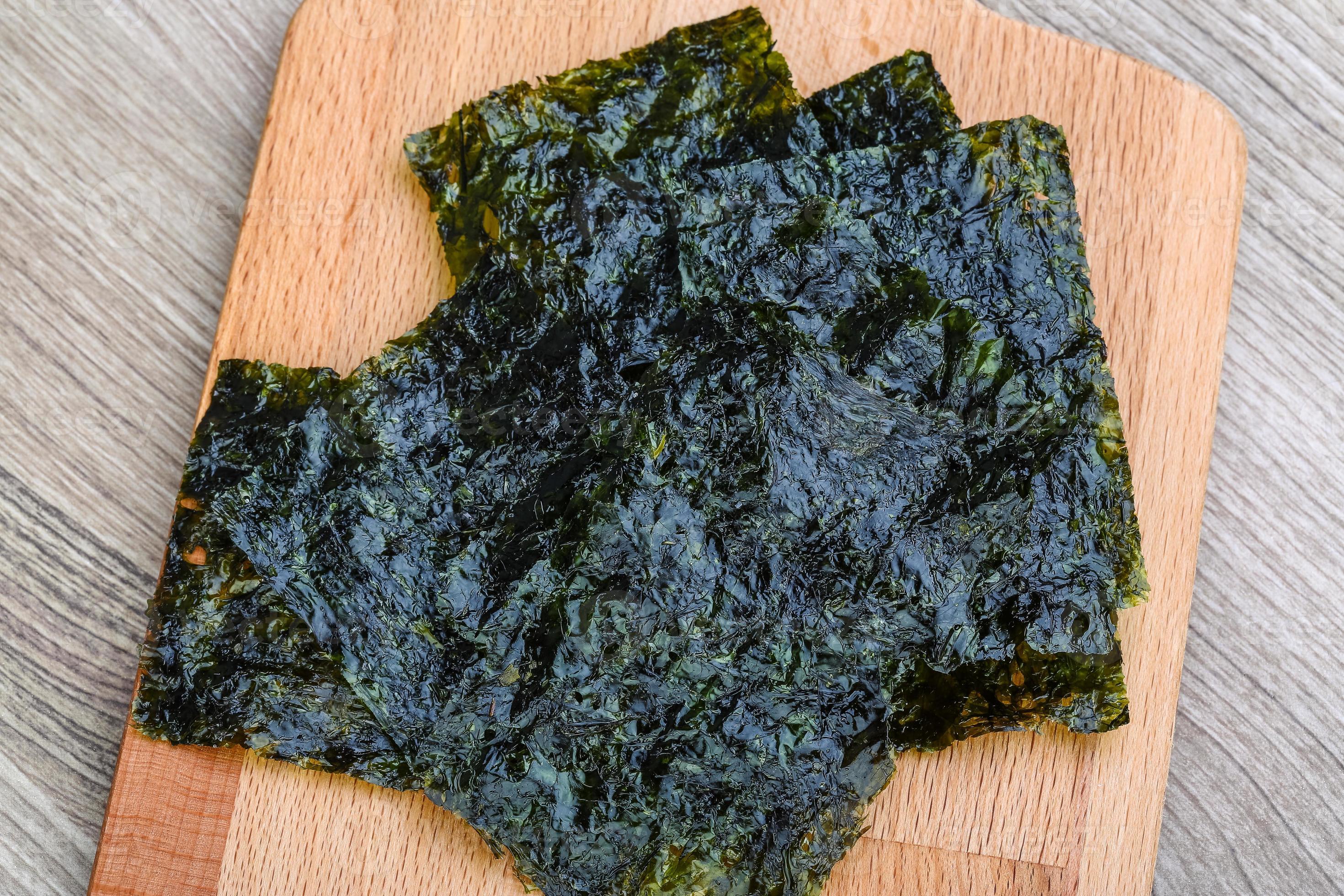 Nori seaweed sheets 8472480 Stock Photo at Vecteezy