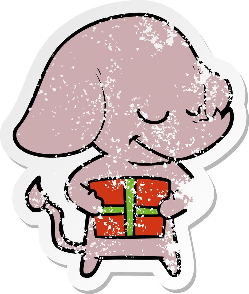 distressed sticker of a cartoon smiling elephant with present vector