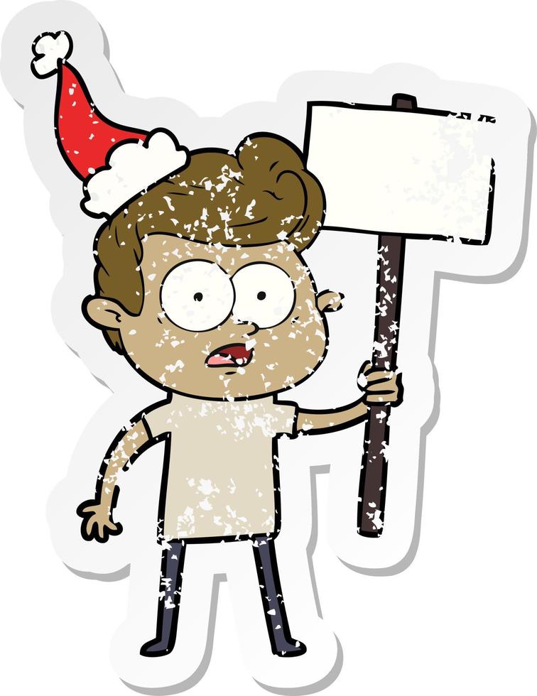 distressed sticker cartoon of a staring man wearing santa hat vector