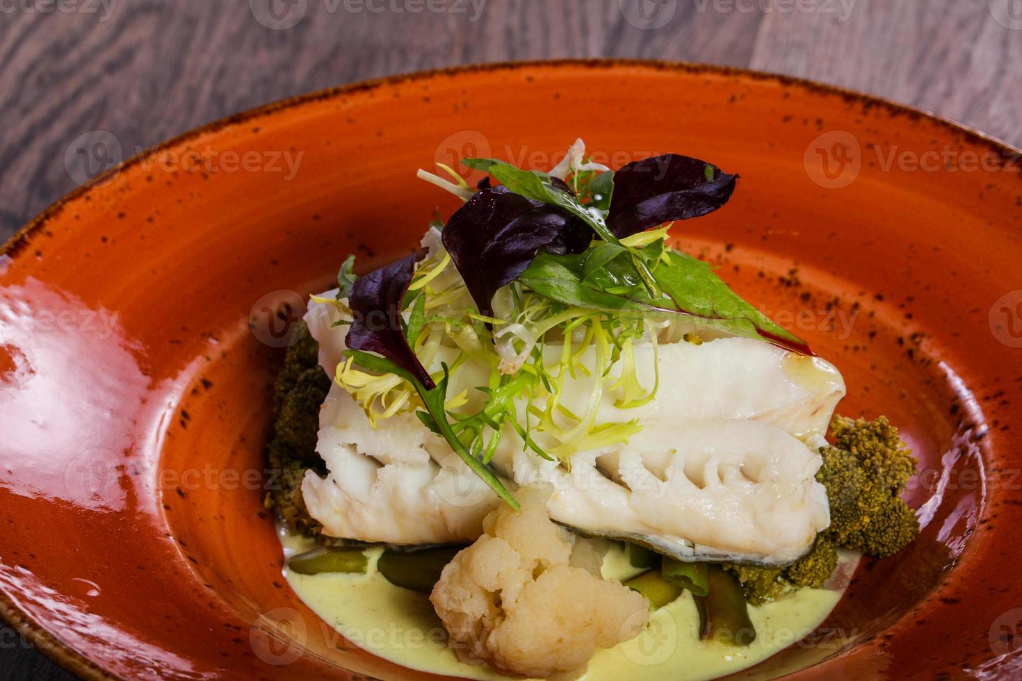 Steamed fith with salad photo