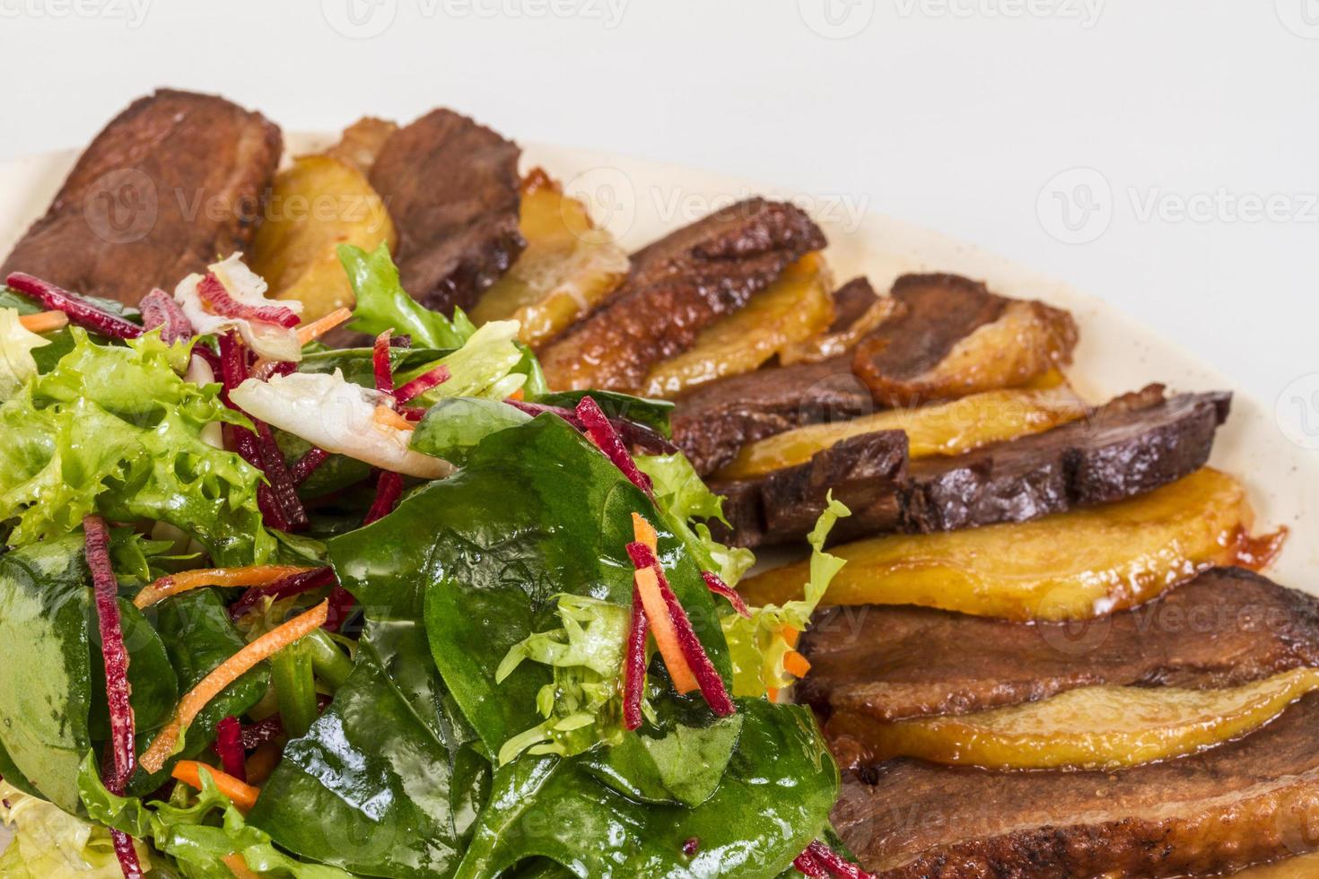 duck fillet, mashed potatoes seasoned with truffle oil, fig and aniseed sauce photo