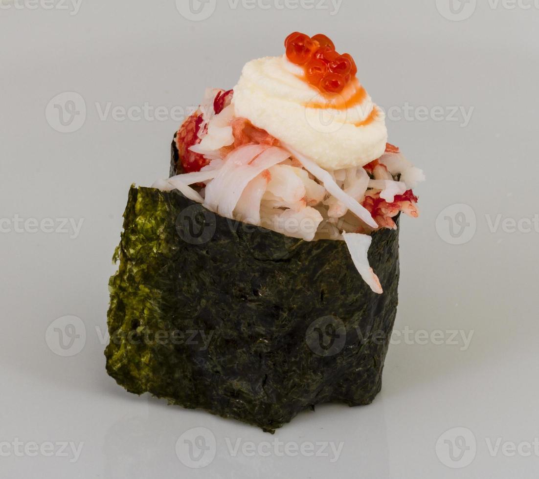 sushi kani with sauced slices of crab shrimp isolated on white background photo