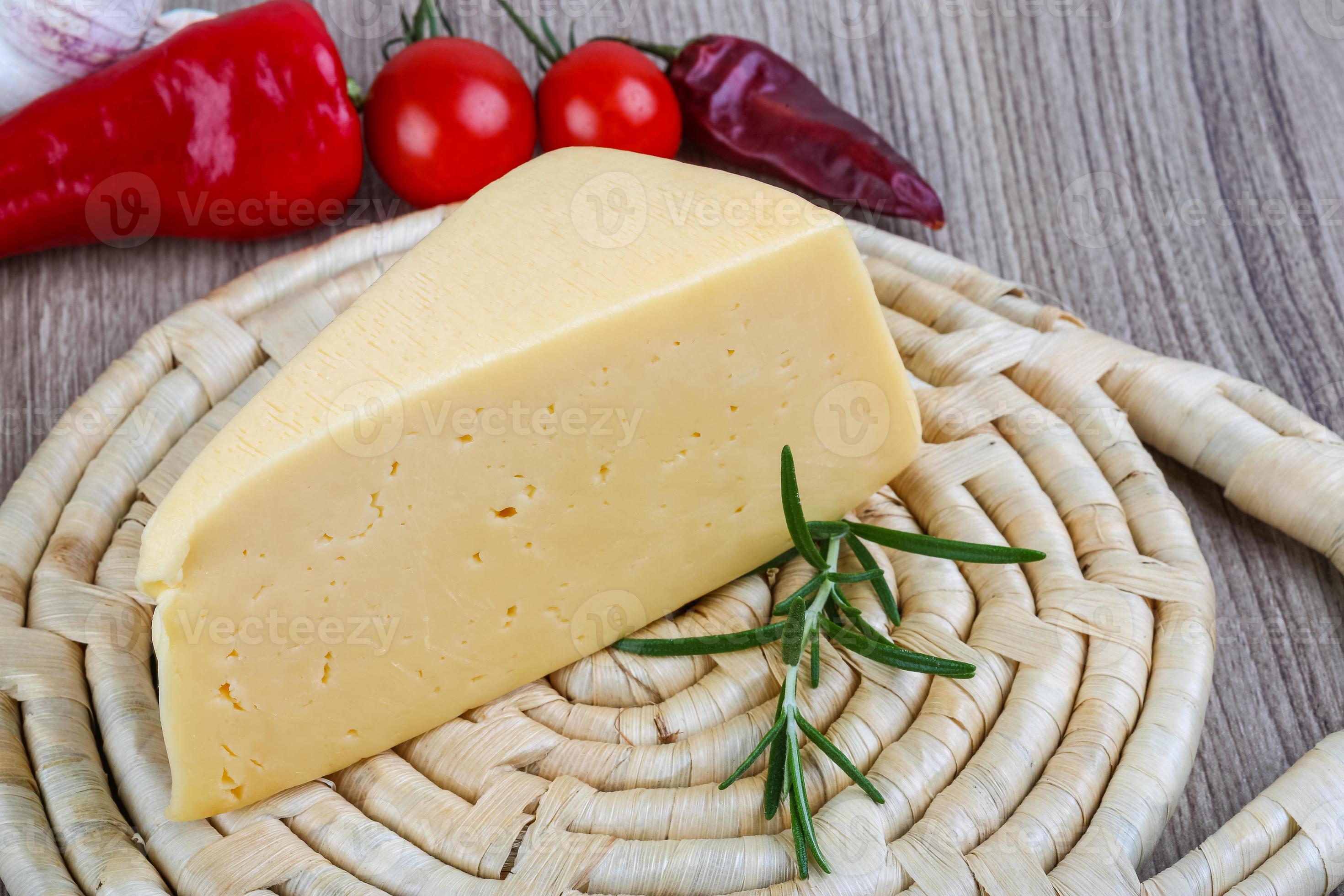 Yellow cheese triangle 8473940 Stock Photo at Vecteezy